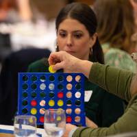 person playing Connect 4 photo 3